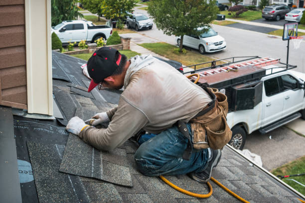 Professional Roofing technician working in Park City, UT